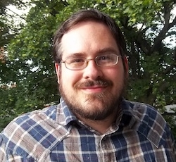 Dave Mayo standing on his porch